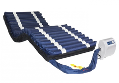 Roll-up air mattress with control panel on a white background