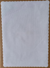 White fabric tork traymat on a brown background