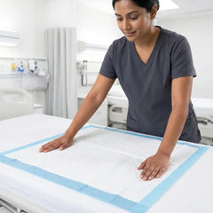 Extra large medical bed underpad with waterproof backing providing leak proof protection for hospital and aged care mattress lines.