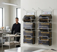 Wall-mounted display of Mediflex Black Storm products in a clinical setting.